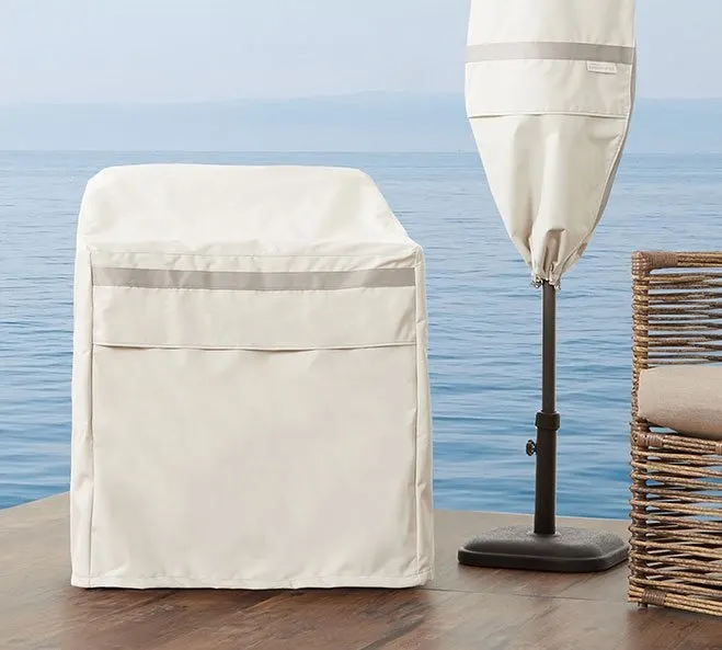 outdoor patio chair and umbrella with covers